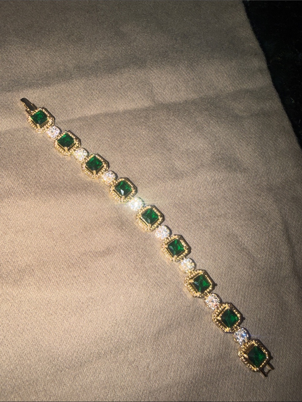 Gold-Tone Bracelet with Emerald Green Stones and Moissonite diamonds